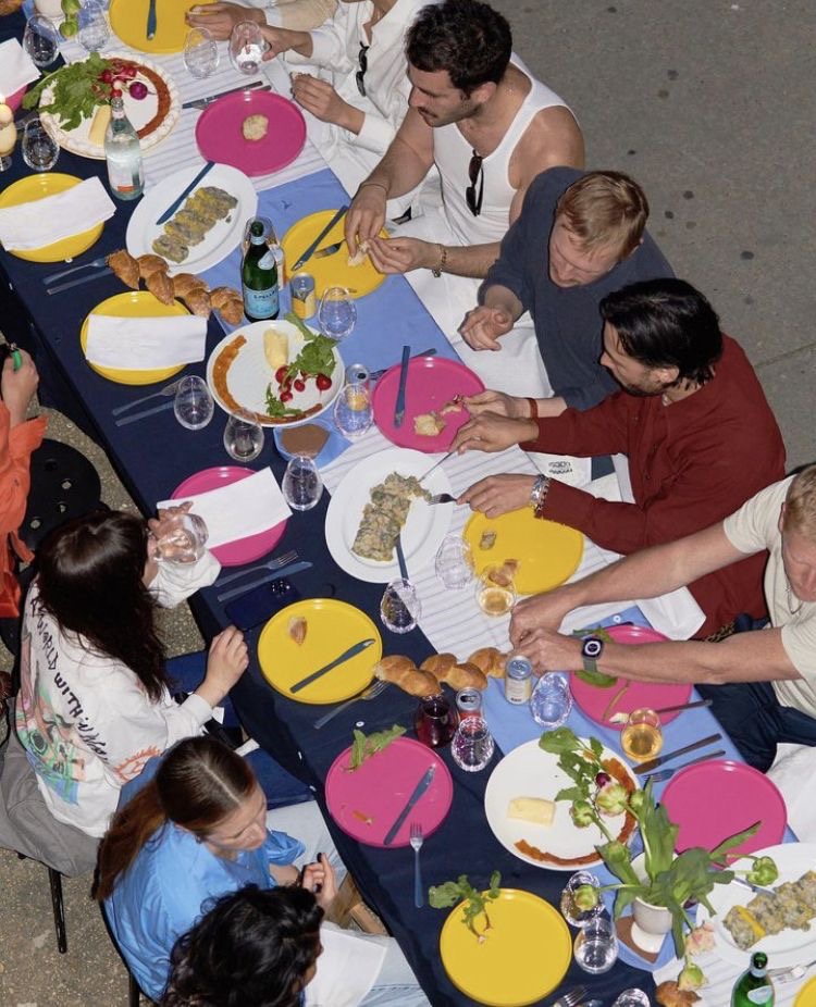 Overhead view of a colorful shared dinner table